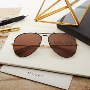 แว่นกันแดด Gucci GG0515S 002 Black / Shiny Gold Metal