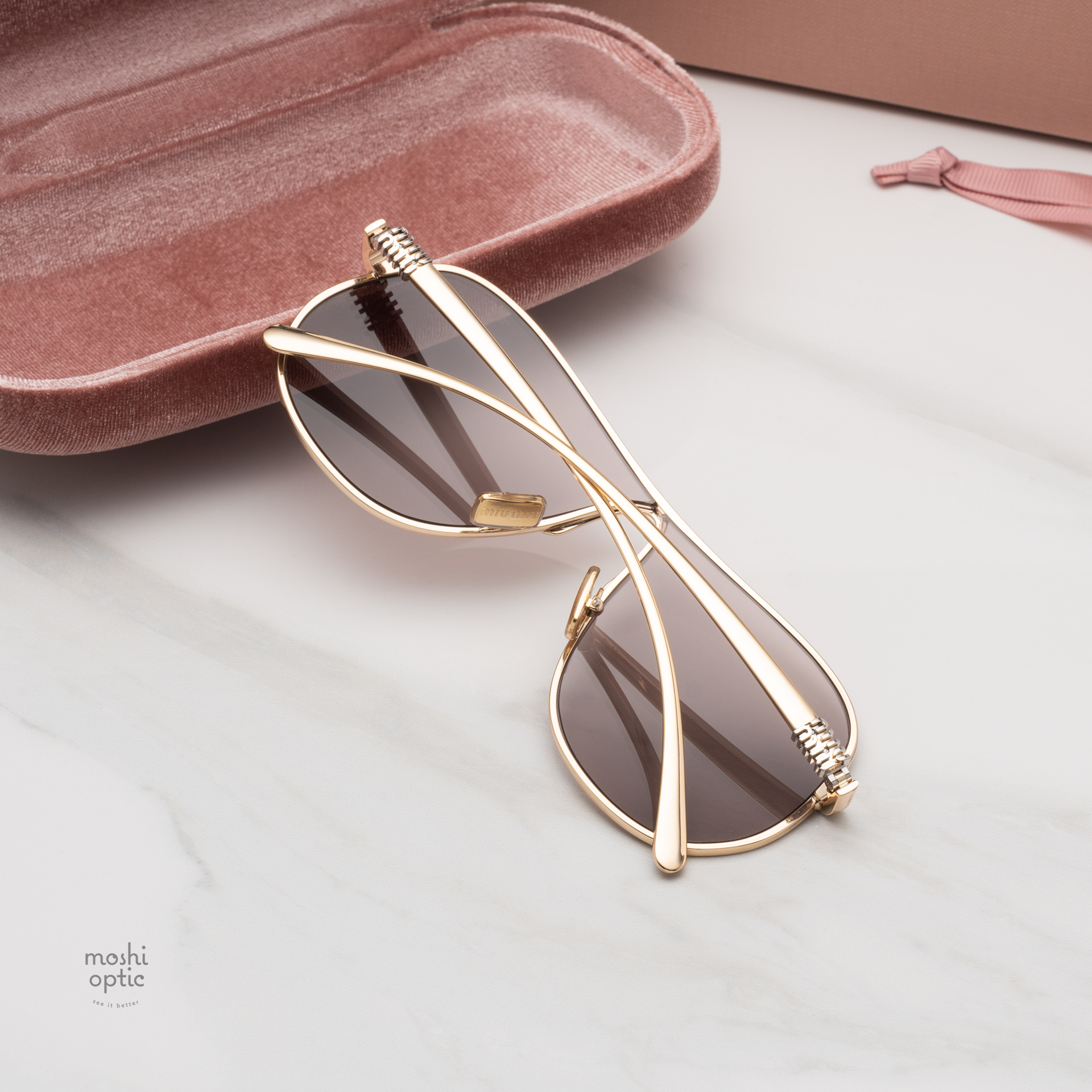 แว่นกันแดด Miu Miu MUA56S 5AK20I