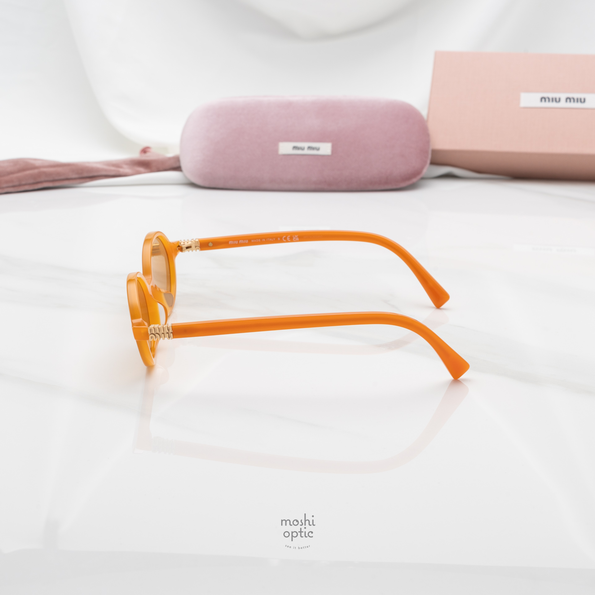 แว่นกันแดด Miu Miu MU04ZSF 11V40D
