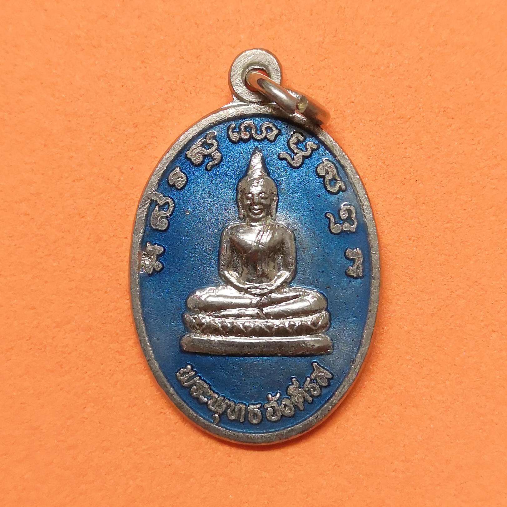 เหรียญ พระพุทธอังคีรส สร้างเพื่อเป็นสิริมงคลงานปีใหม่-งานกาชาด จังหวัดระยอง ปี 2535 เนื้อกะไหล่เงินลงยา สูง 2.5 เซน