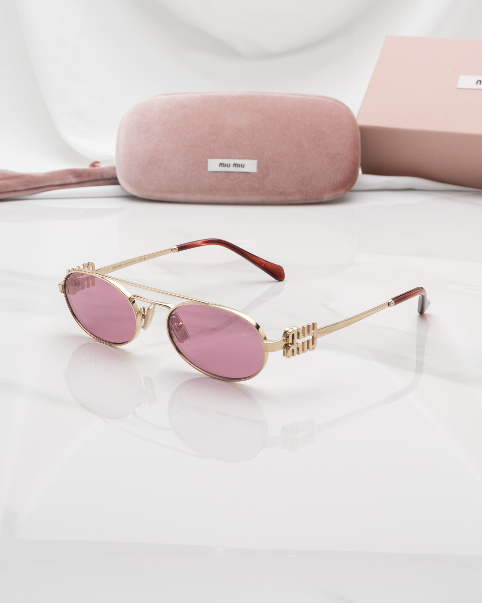 แว่นกันแดด Miu Miu MU54ZS ZVN50D