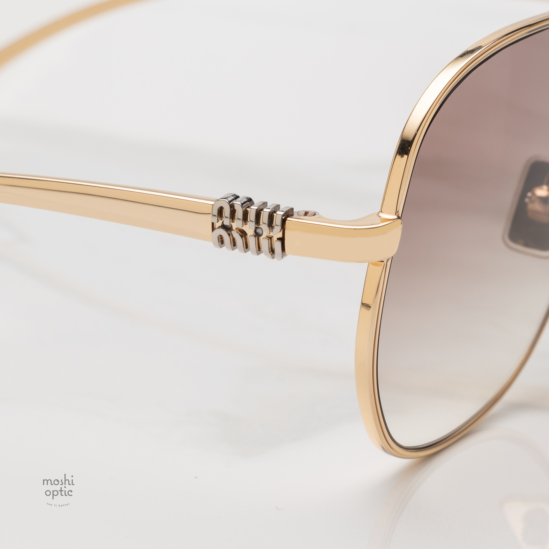 แว่นกันแดด Miu Miu MUA56S 5AK90L