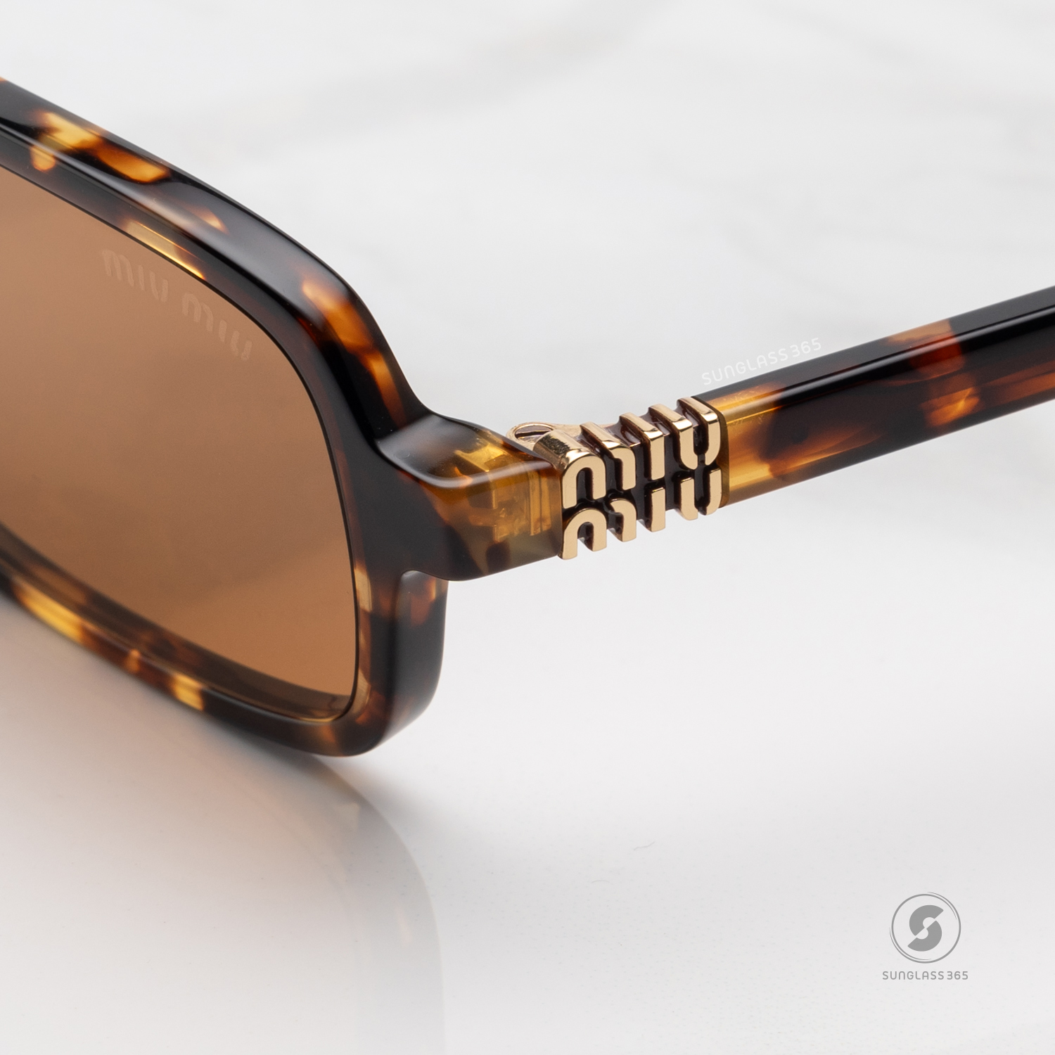 แว่นกันแดด Miu Miu MU11ZSF VAU2Z1