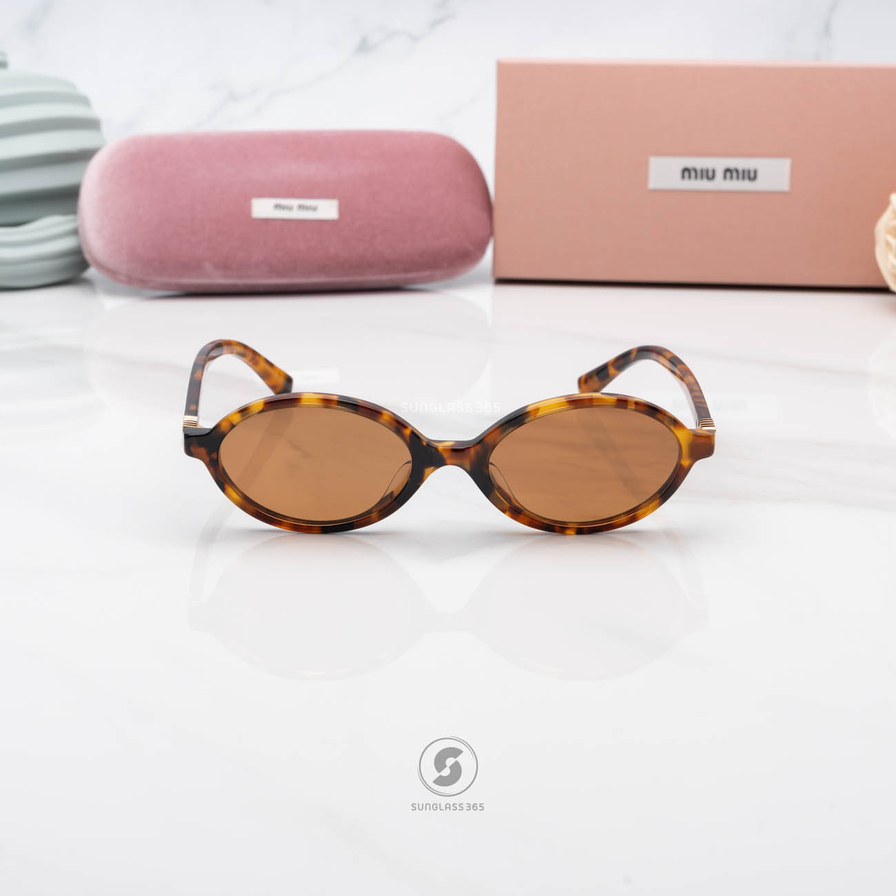 แว่นกันแดด Miu Miu MU04ZSF 19P2Z1