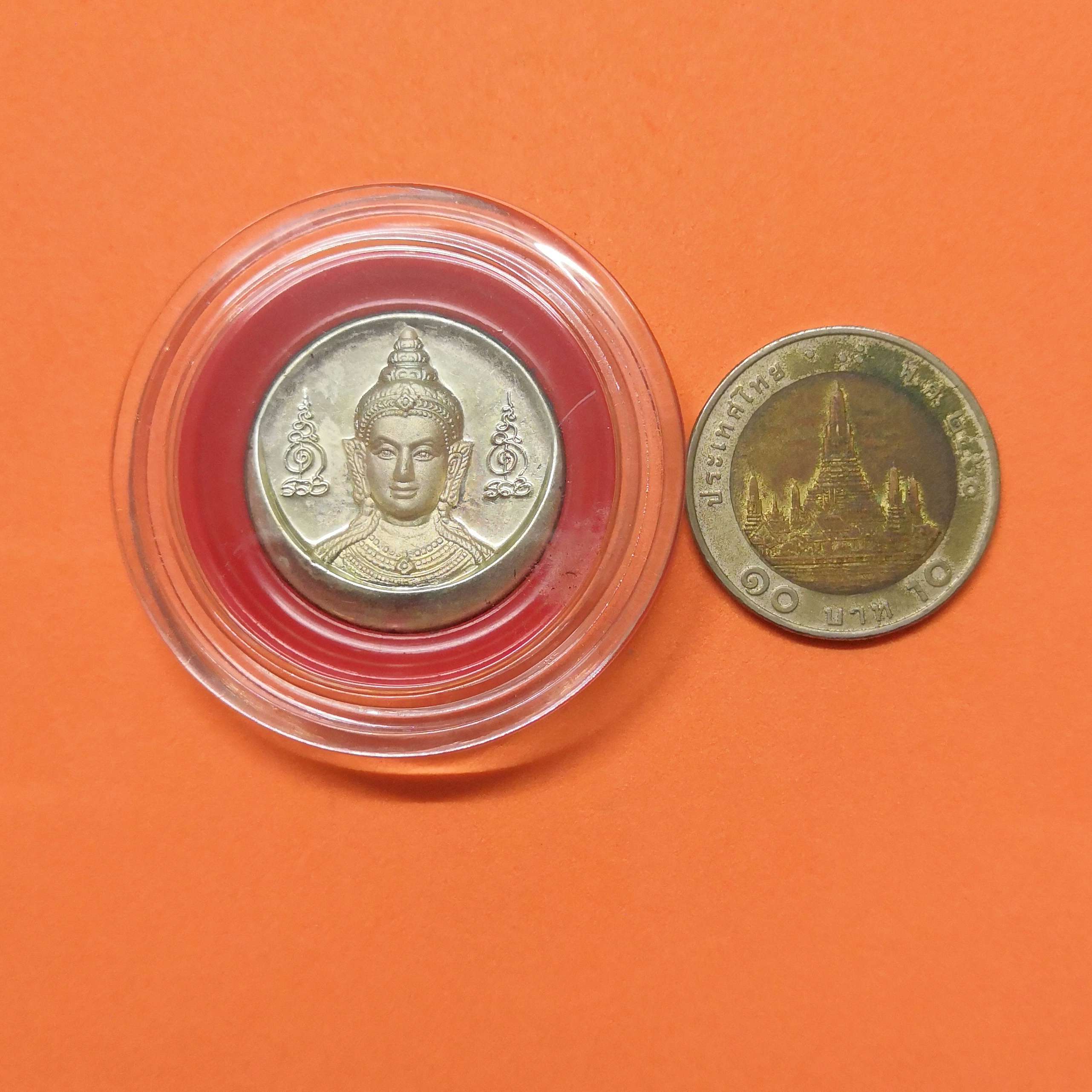 เหรียญพิมพ์เล็ก จตุคามรามเทพ รุ่น โคตรรวย วัดโคกโพธิ์สถิตย์ จ.นครศรีธรรมราช ปี 2550 เนื้อกะไหล่เงิน ขนาด 2.5 เซน