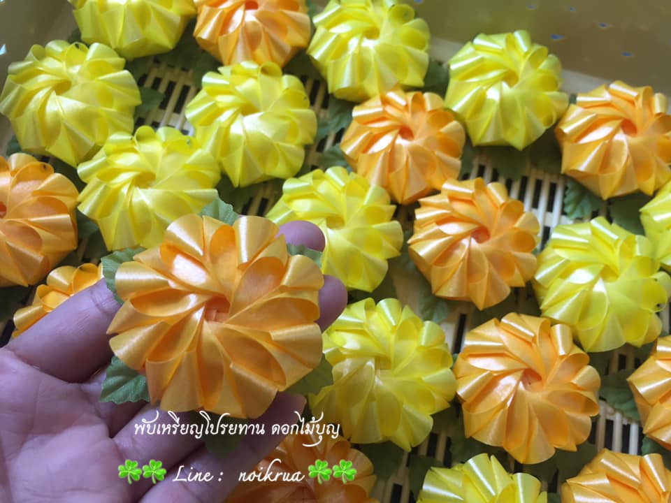 ดอกดาวเรือง เหรียญโปรยทาน