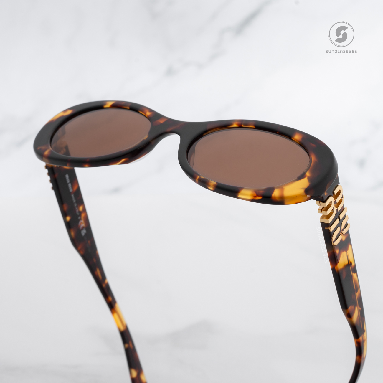 แว่นกันแดด Miu Miu MU06ZS VAU06B