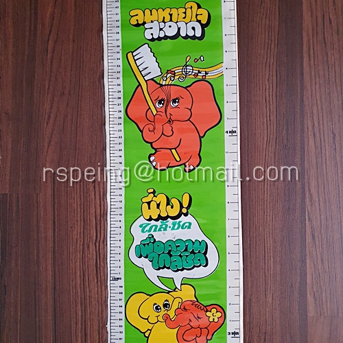 โปสเตอร์วัดส่วนสูงติดผนัง ยาสีฟันใกล้ชิด