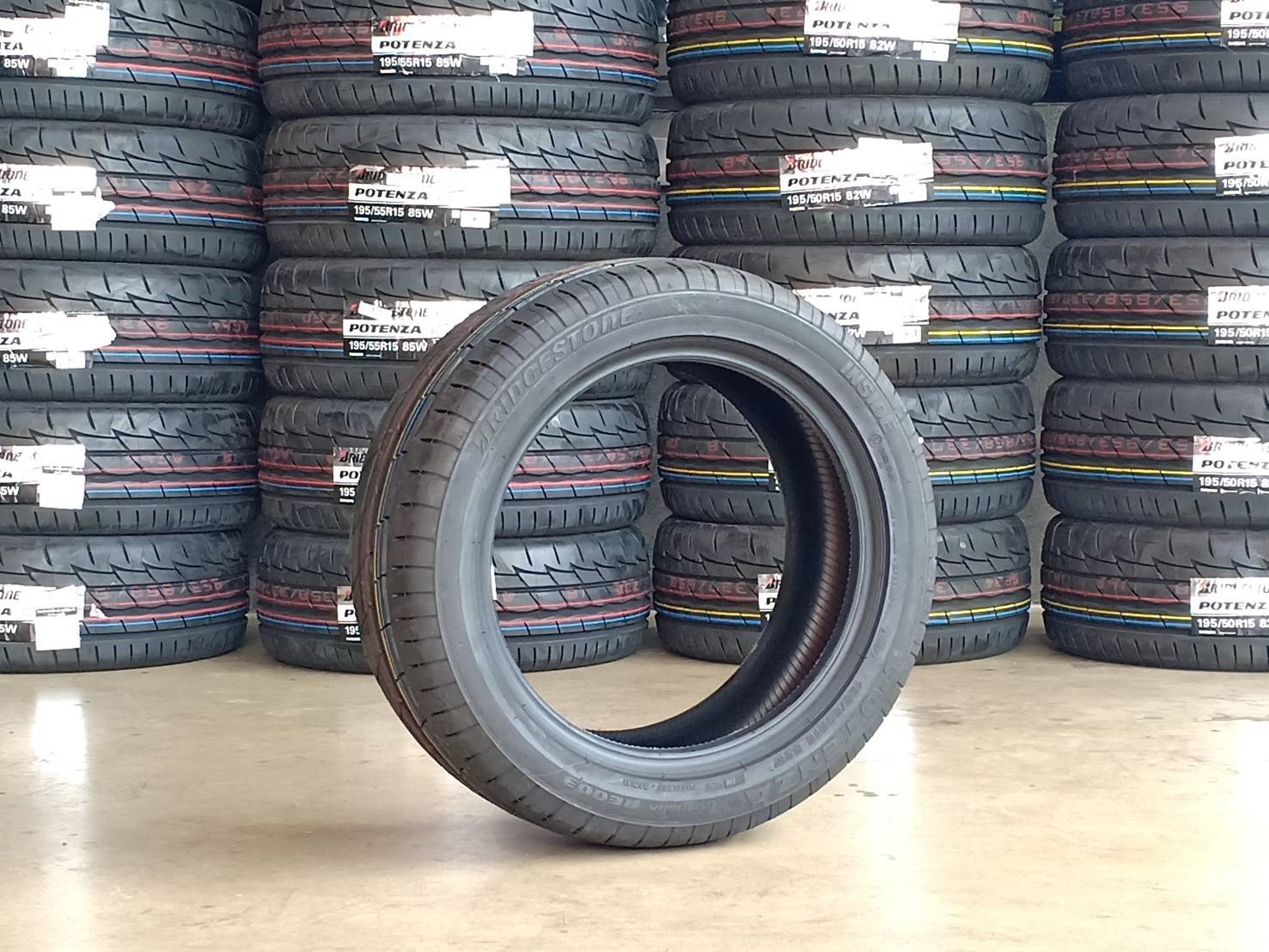BRIDGESTONE RE003 195-50-15,195-55-15 ราคา พิเศษ