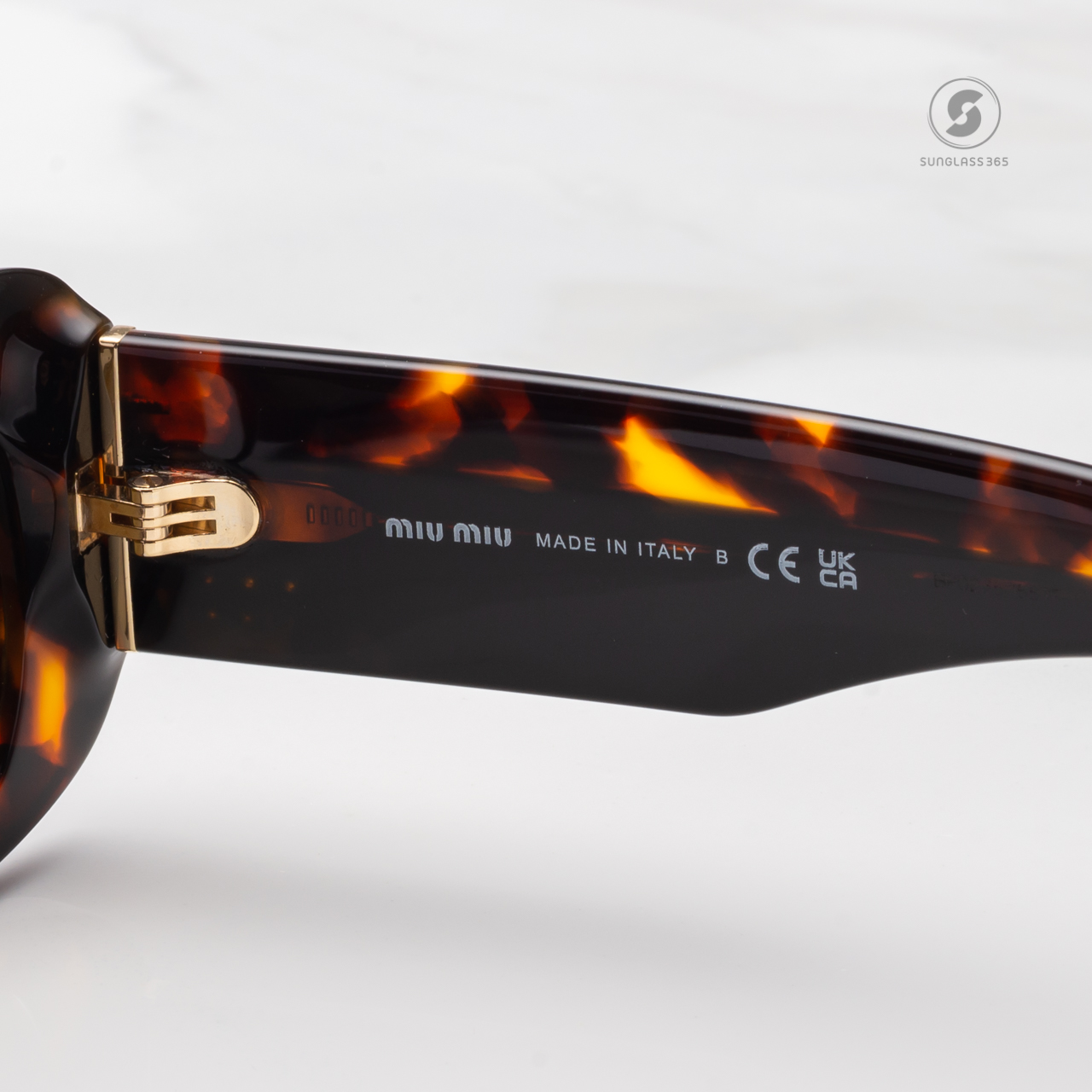 แว่นกันแดด Miu Miu MU08YS VAU01T