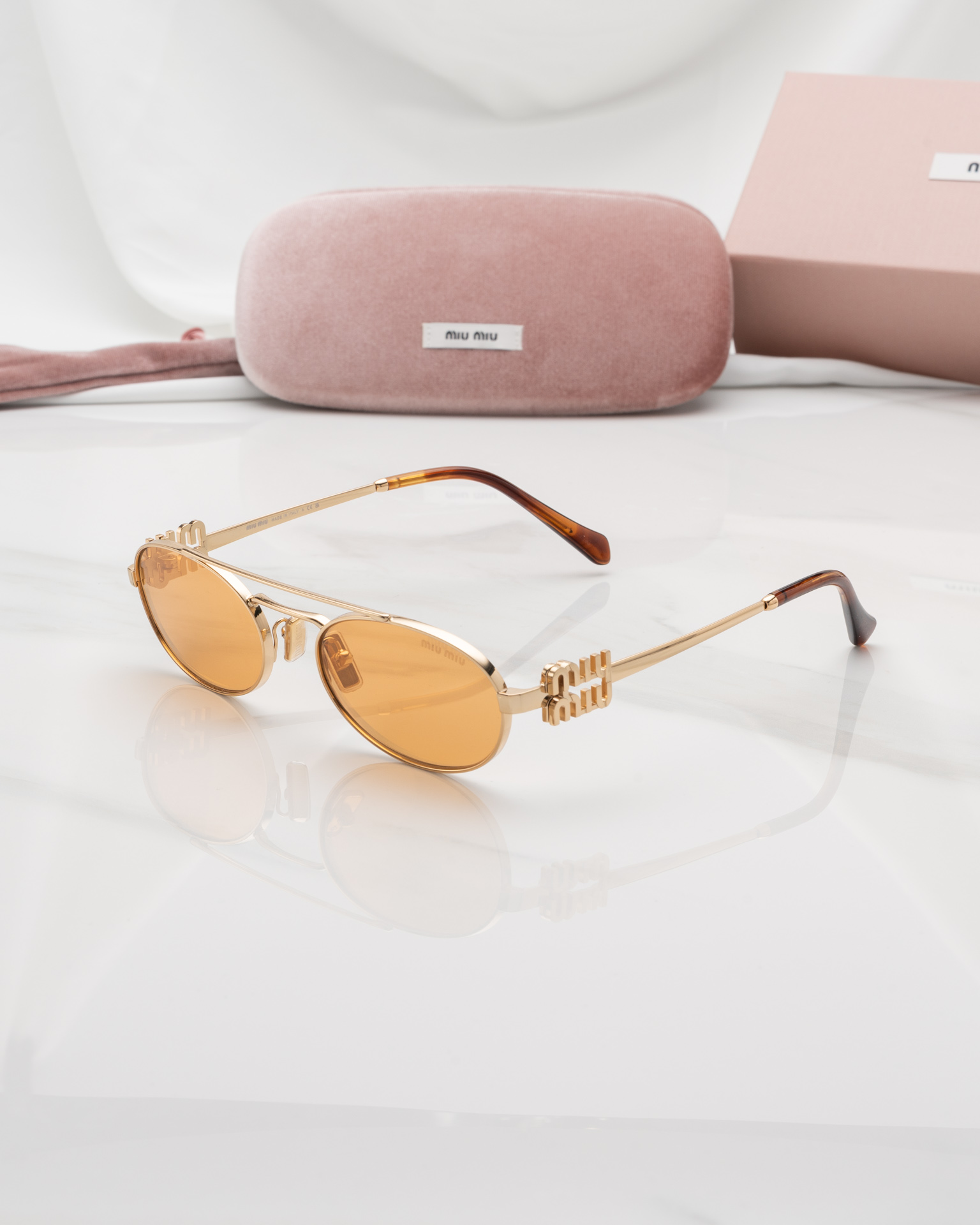 แว่นกันแดด Miu Miu MU54ZS 5AK40D