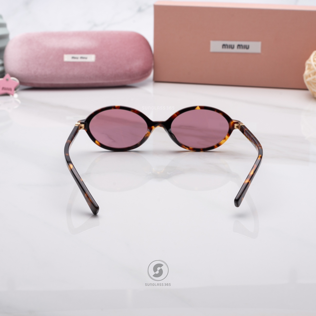 แว่นกันแดด Miu Miu MU04ZSF VAU50D