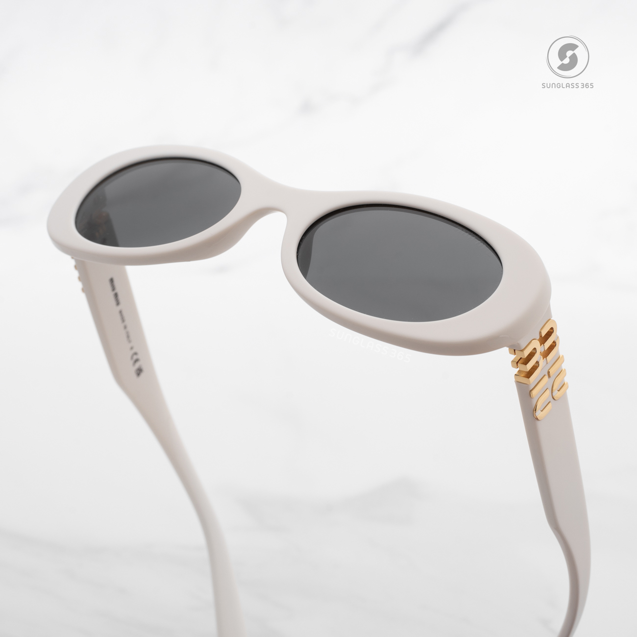 แว่นกันแดด Miu Miu MU06ZS 1425S0