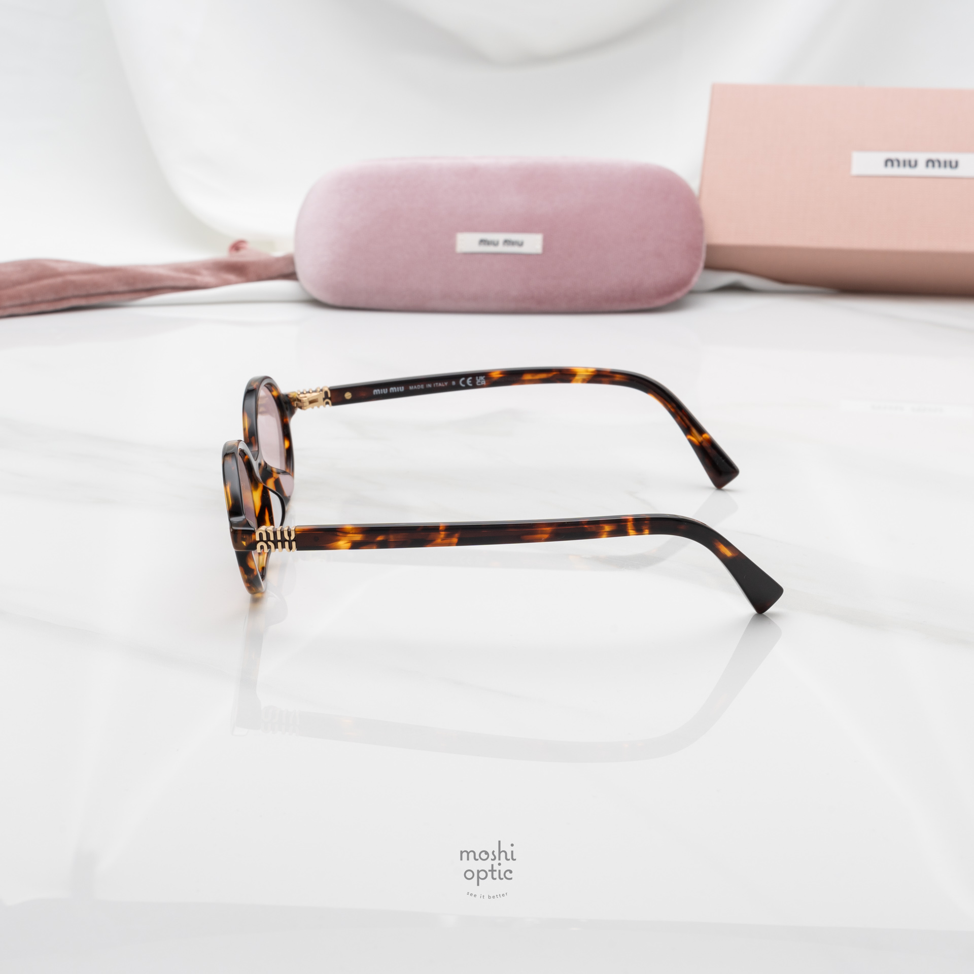 แว่นกันแดด Miu Miu MU04ZSF 14L4I0