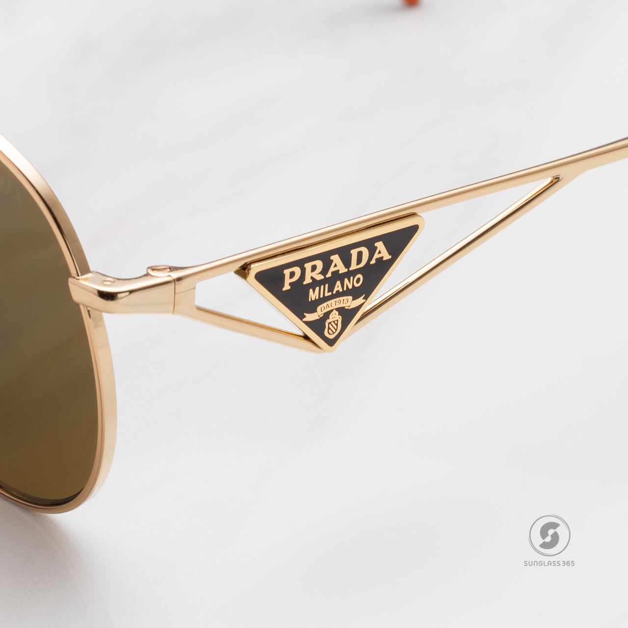 PRADA PR73ZS 5AK01T Gold
