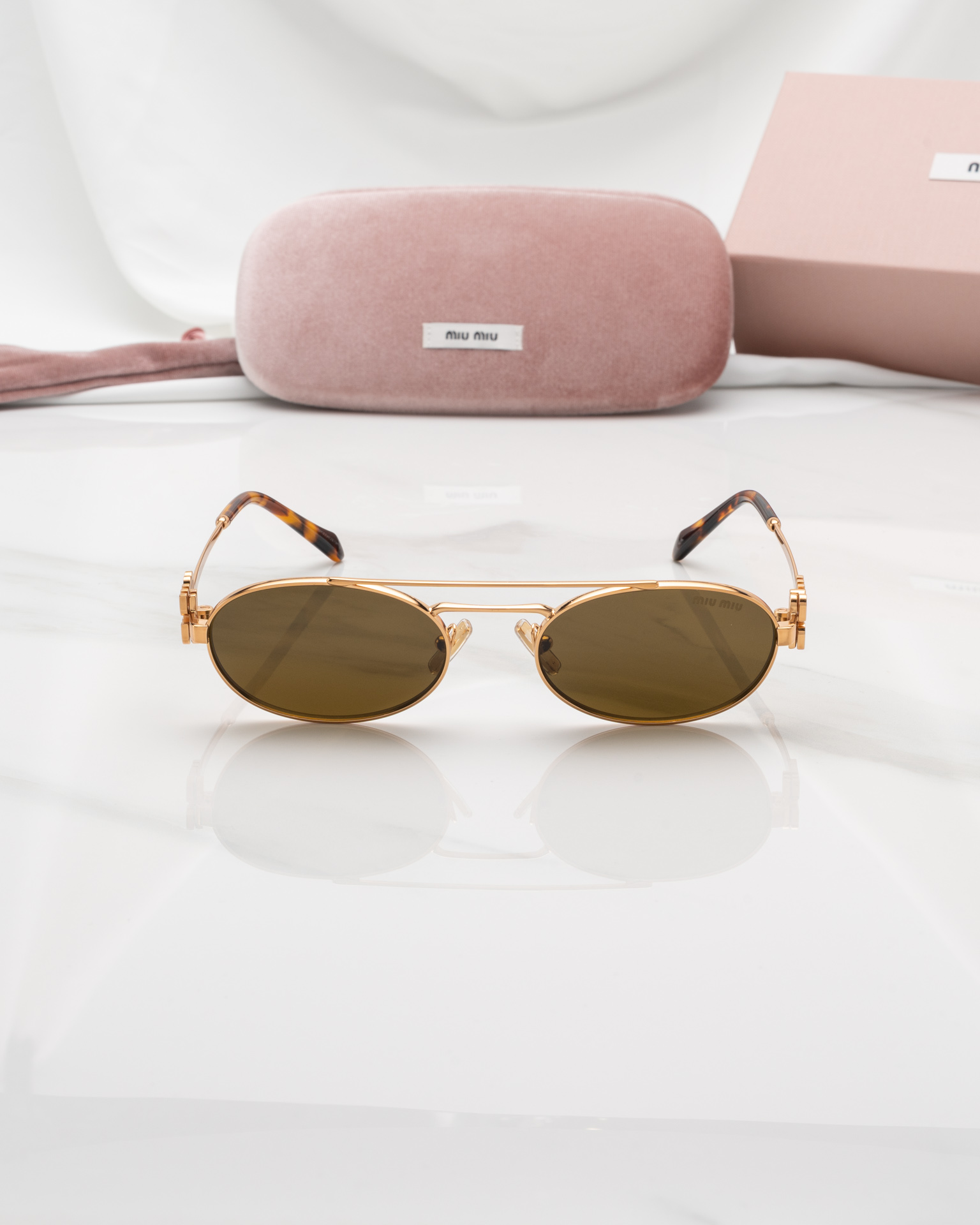 แว่นกันแดด Miu Miu MU54ZS 70E09Z