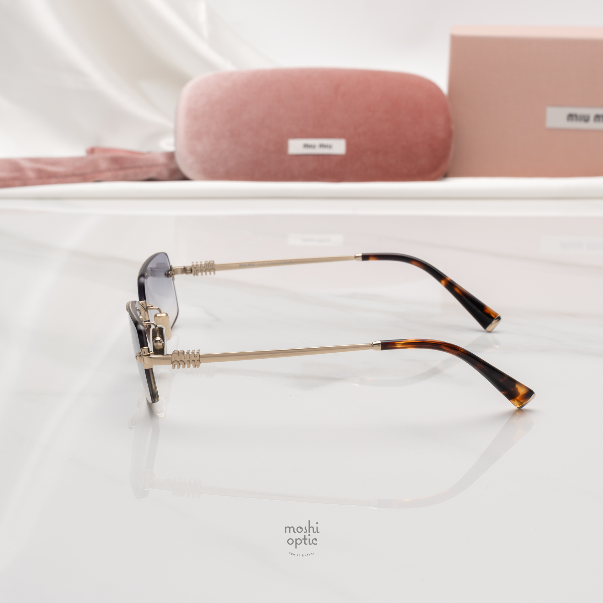 แว่นกันแดด Miu Miu MUB50S ZVN80O