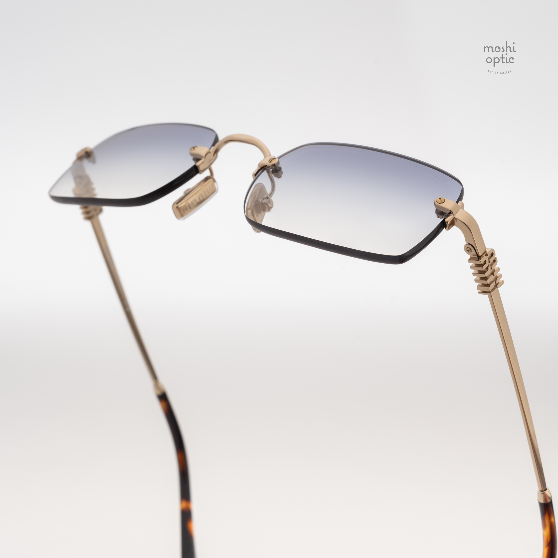 แว่นกันแดด Miu Miu MUB50S ZVN80O