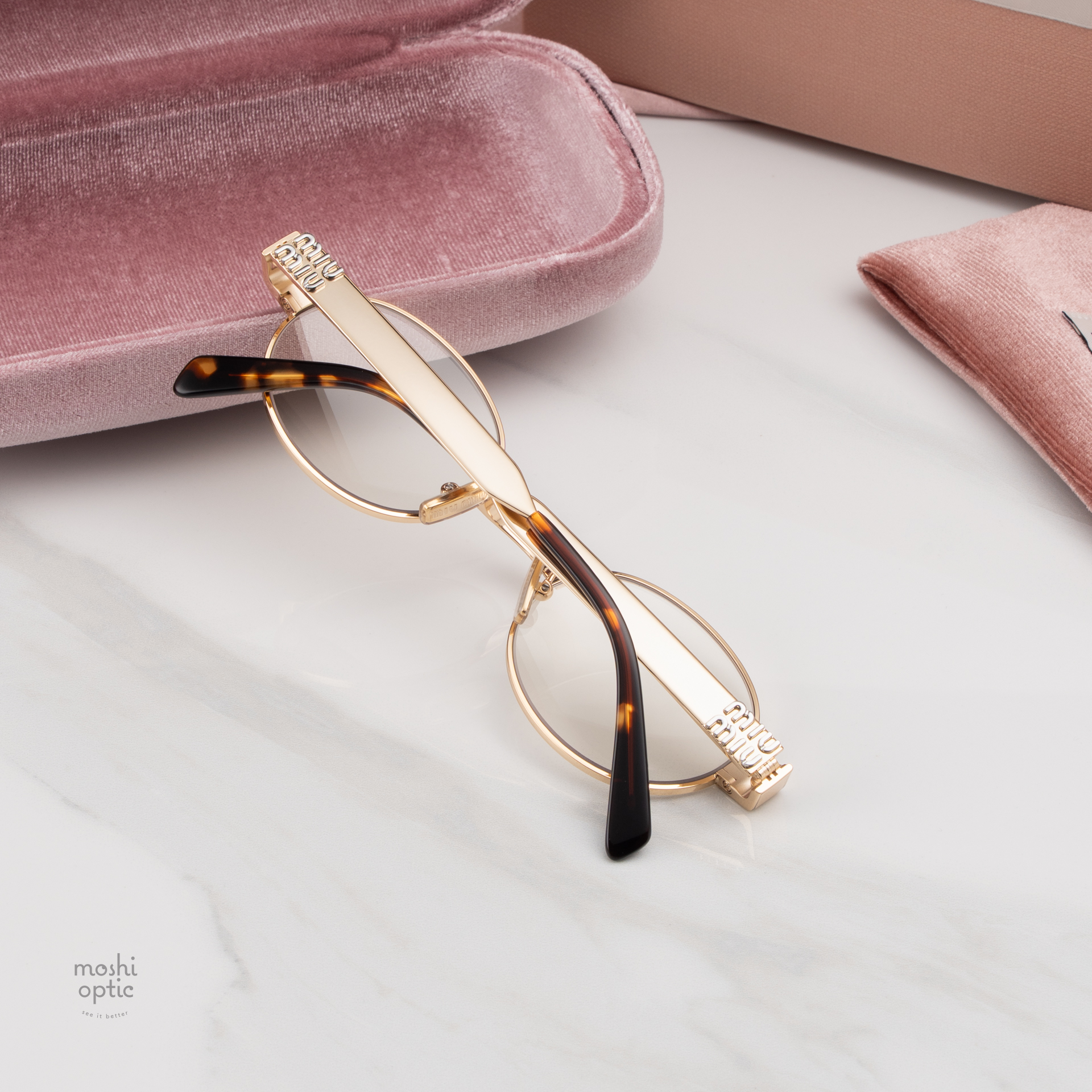 แว่นกันแดด Miu Miu Glimpse MUB51S 5AK10W Gold Blue-violet 