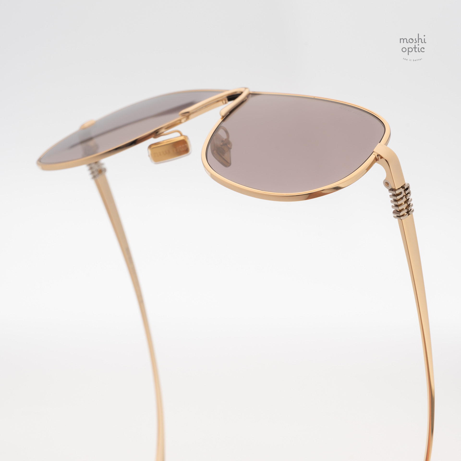 แว่นกันแดด Miu Miu MUA56S 5AK20I