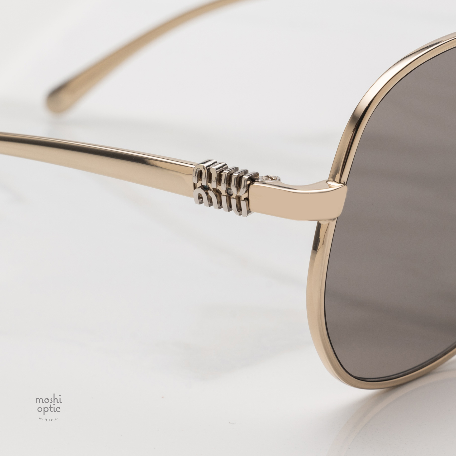 แว่นกันแดด Miu Miu MUA56S ZVN80Q