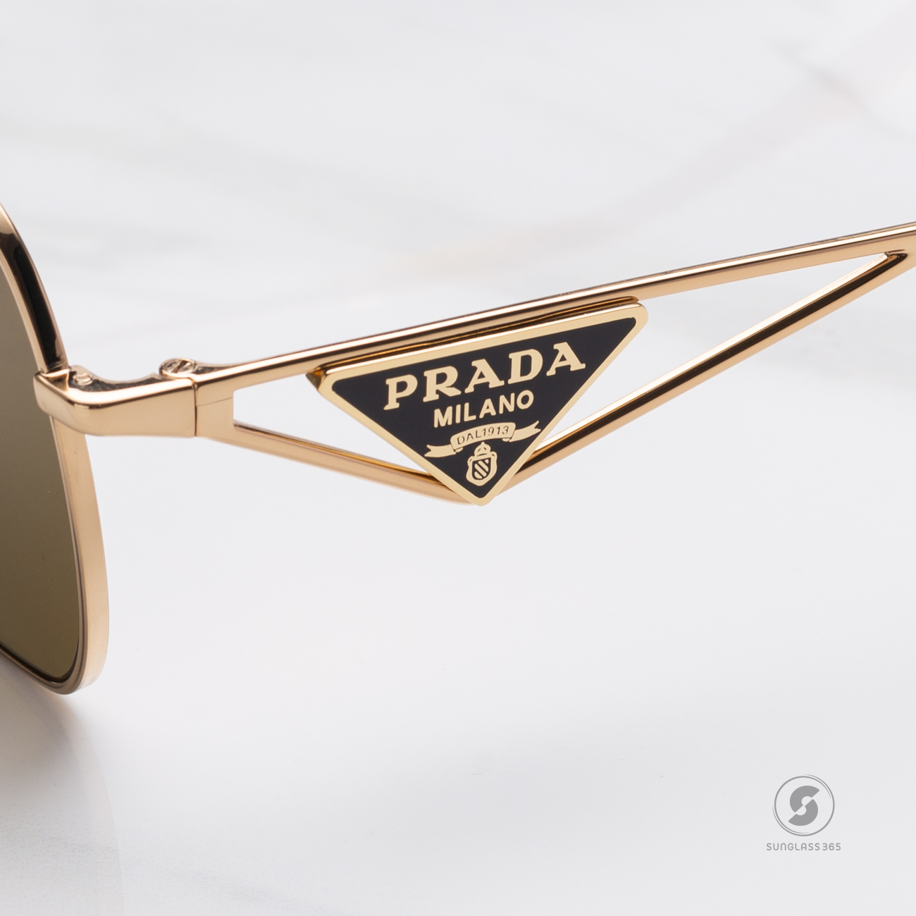 แว่นกันแดด PRADA PRA50S 5AK01T Gold