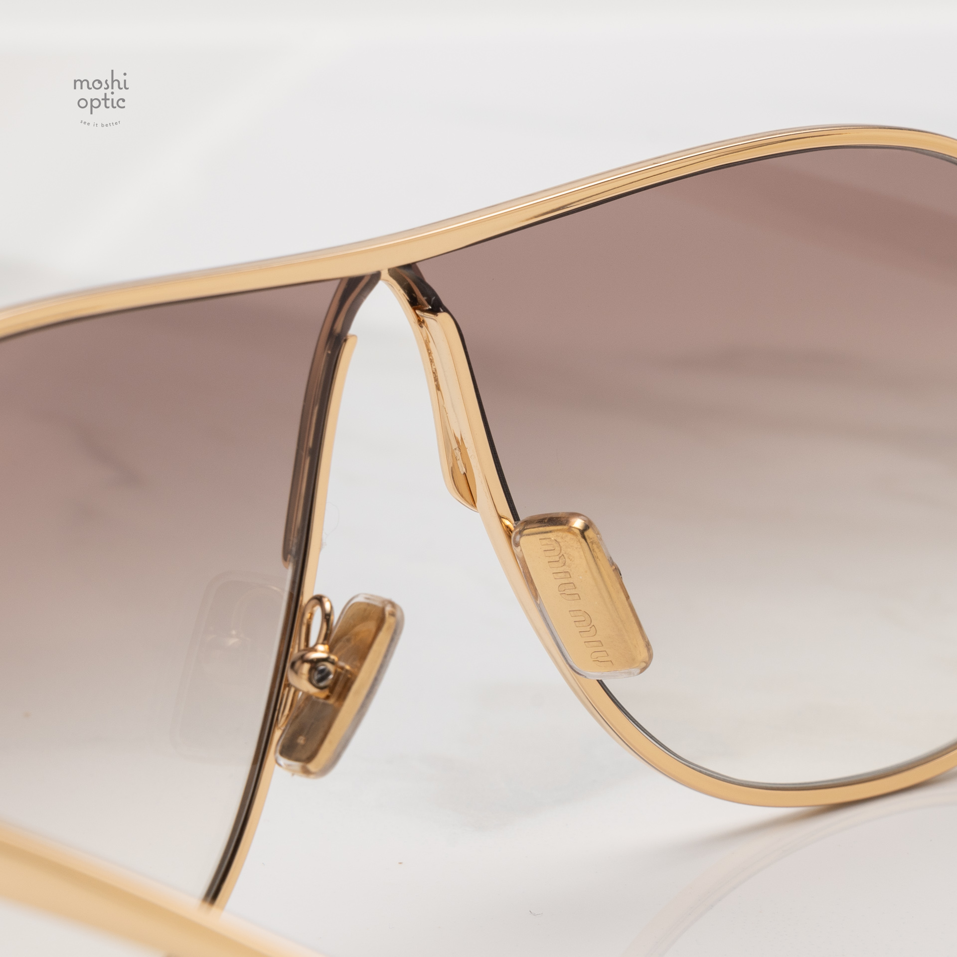 แว่นกันแดด Miu Miu MUA56S 5AK90L