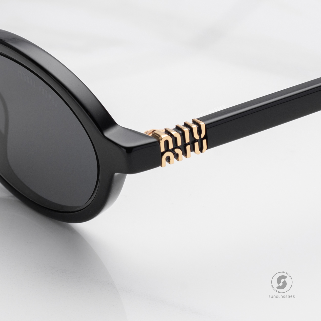 แว่นกันแดด Miu Miu MU04ZSF 1AB5S0