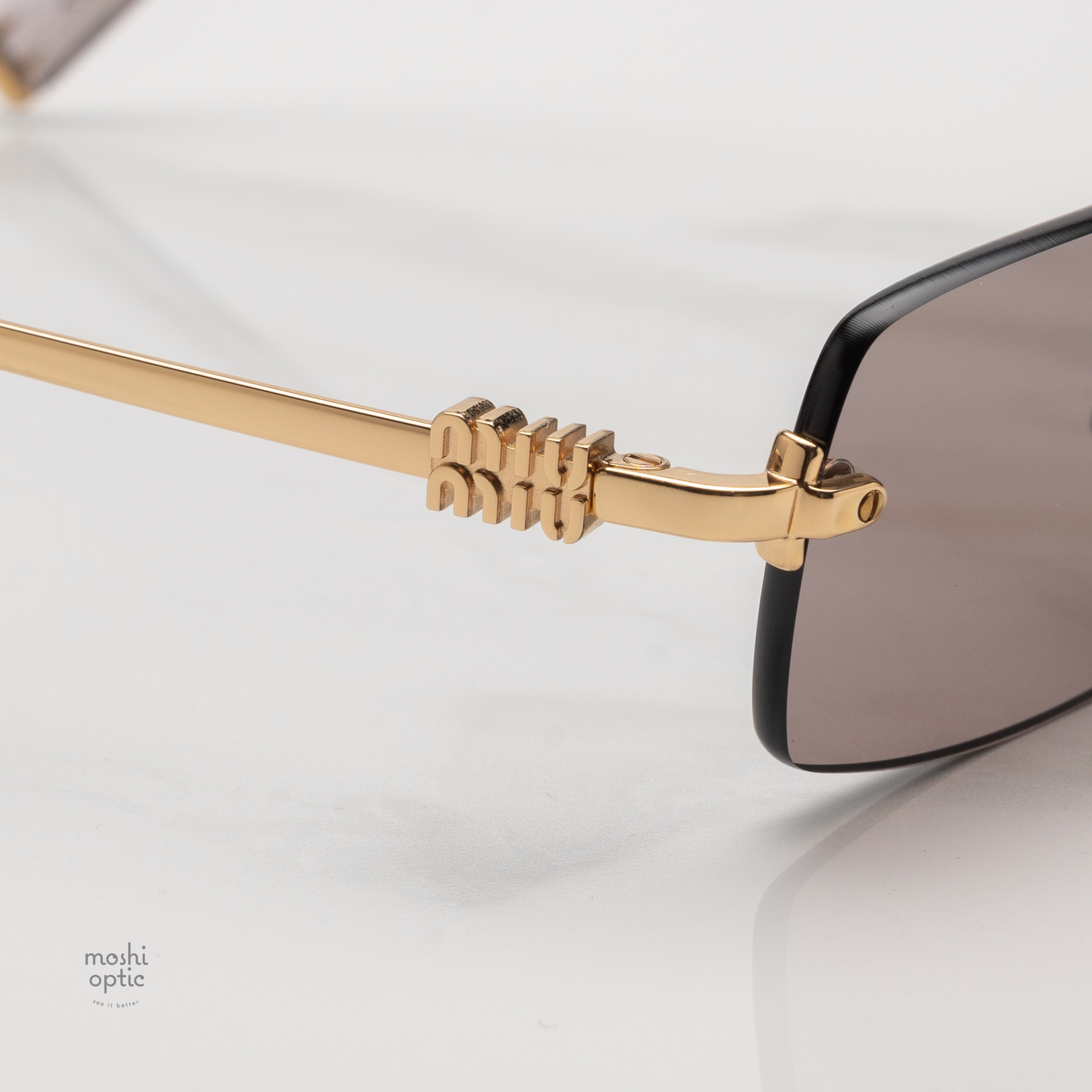 แว่นกันแดด Miu Miu MUB50S 5AK20I