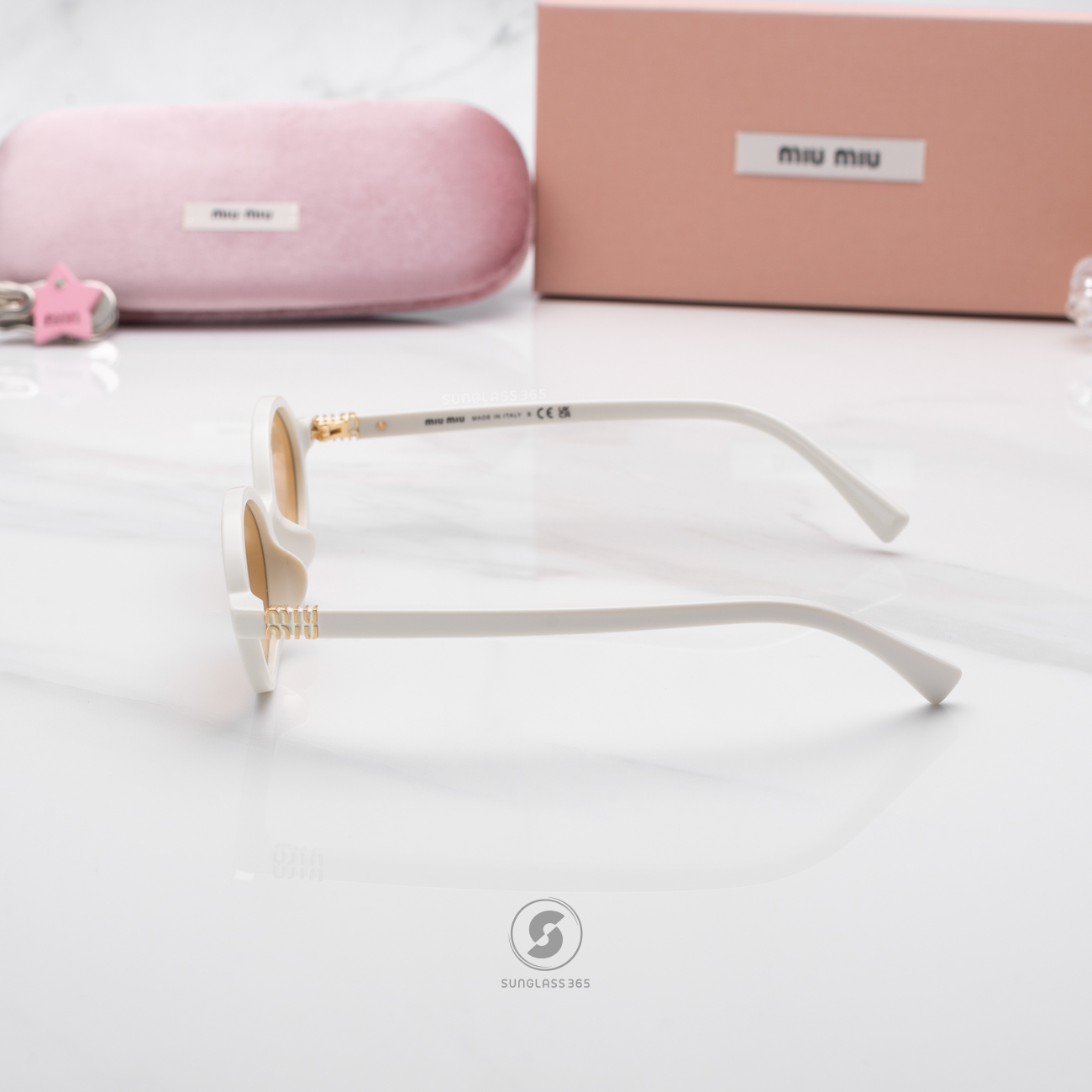 แว่นกันแดด Miu Miu MU04ZSF 14240D