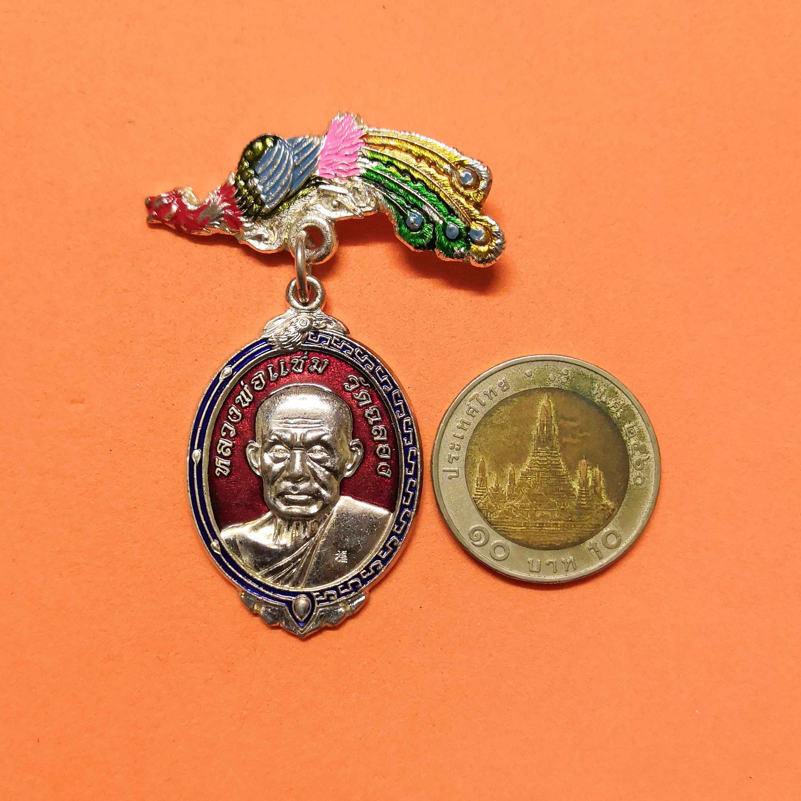 เหรียญ หลวงพ่อแช่ม วัดฉลอง รุ่น กองอาสารักษาดินแดน ภูเก็ต รุ่น 1 ปี 2554 เนื้อกะไหล่เงินลงยา พร้อมเข็มกลัด