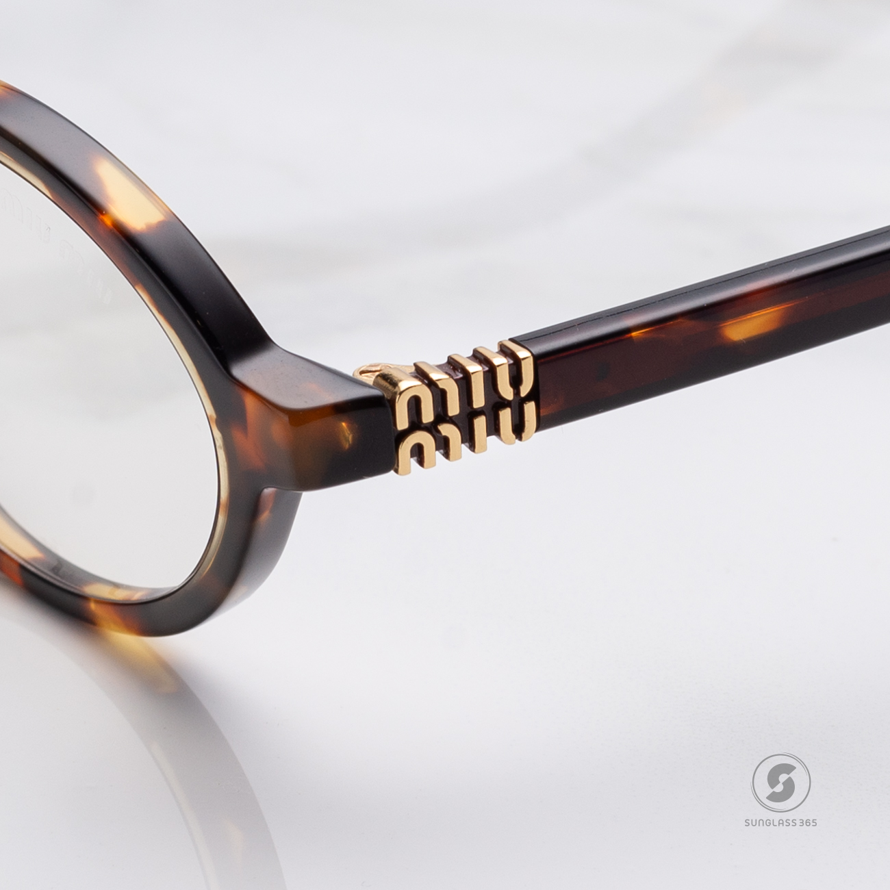 แว่นกันแดด Miu Miu MU04ZSF VAU08N