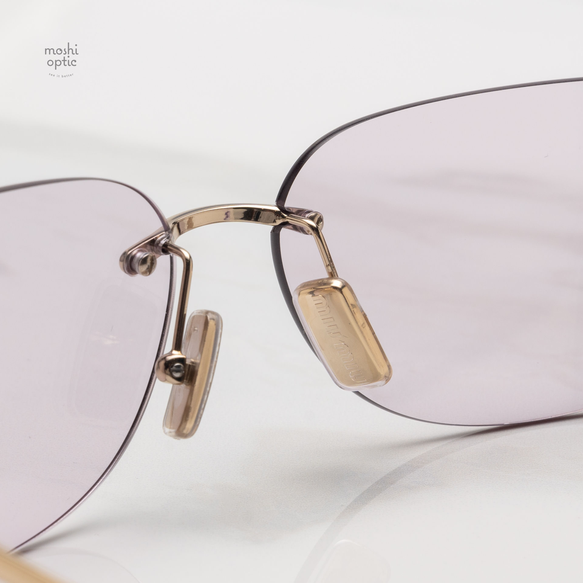 แว่นกันแดด Miu Miu MUA51S ZVN90O สำเนา