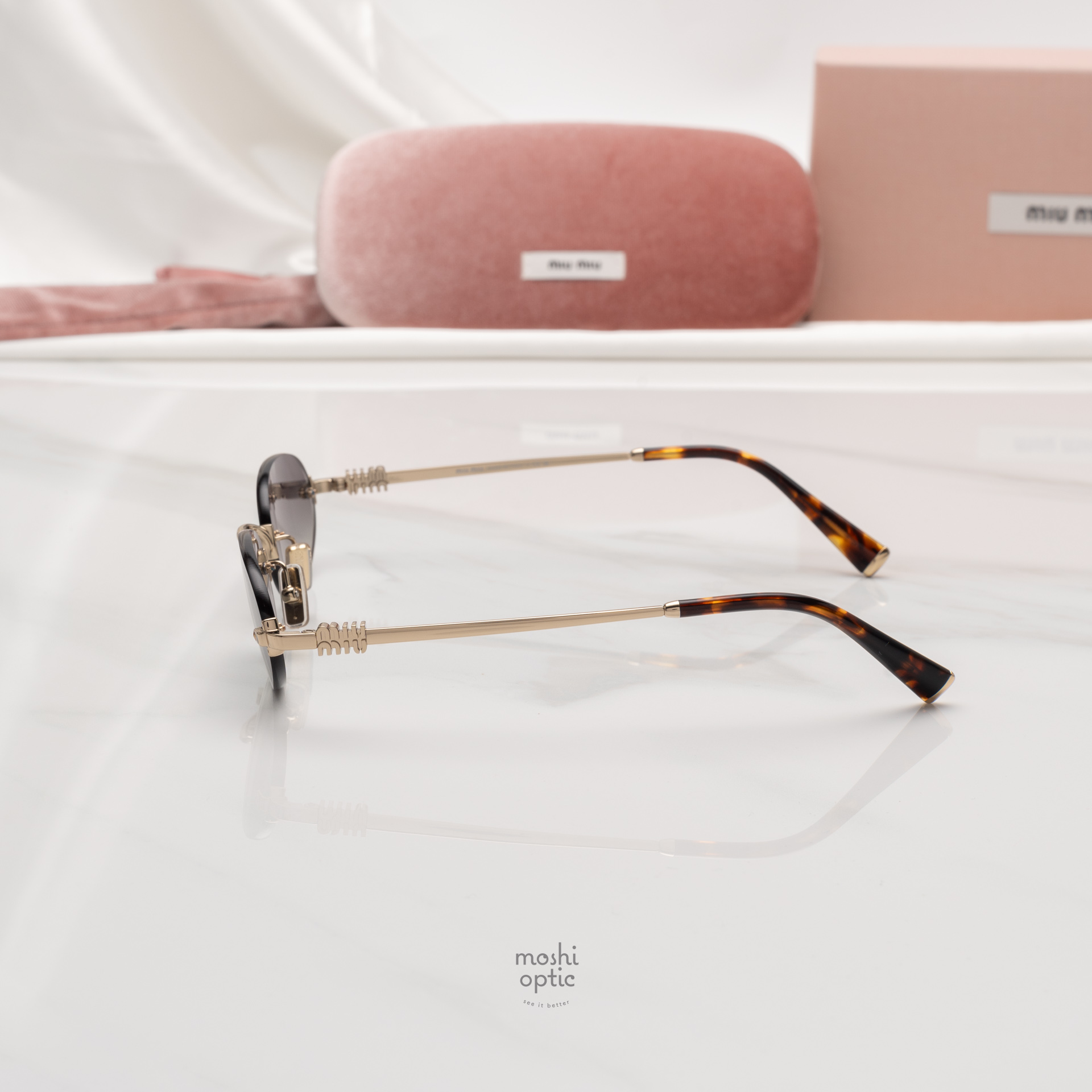 แว่นกันแดด Miu Miu MUA54S ZVN5D1