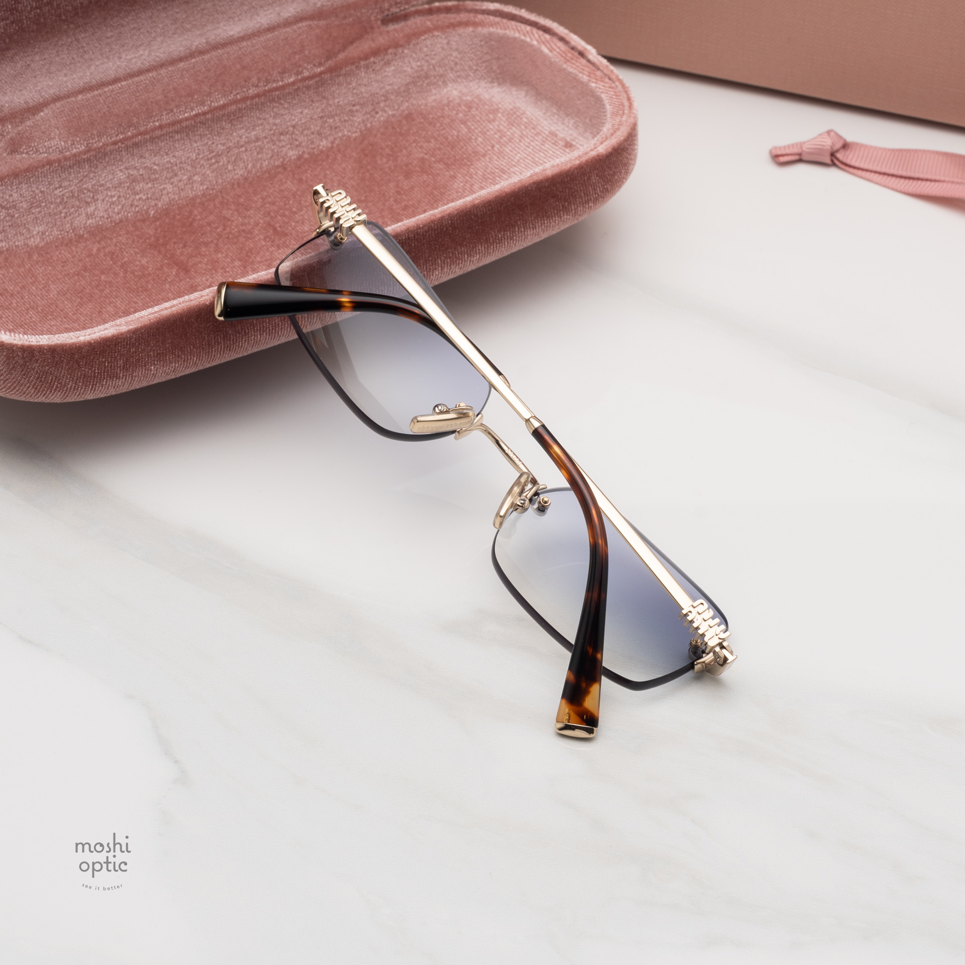 แว่นกันแดด Miu Miu MUB50S ZVN80O