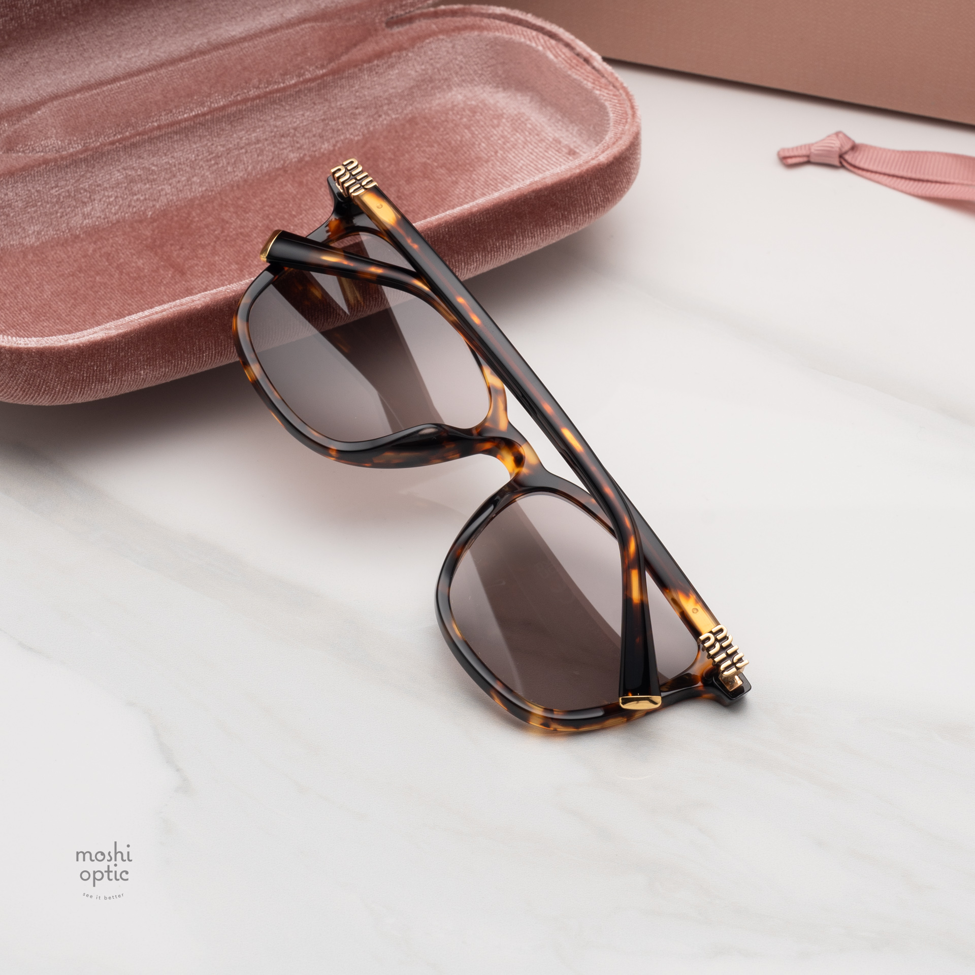 แว่นกันแดด Miu Miu MUB03SF 14L20I