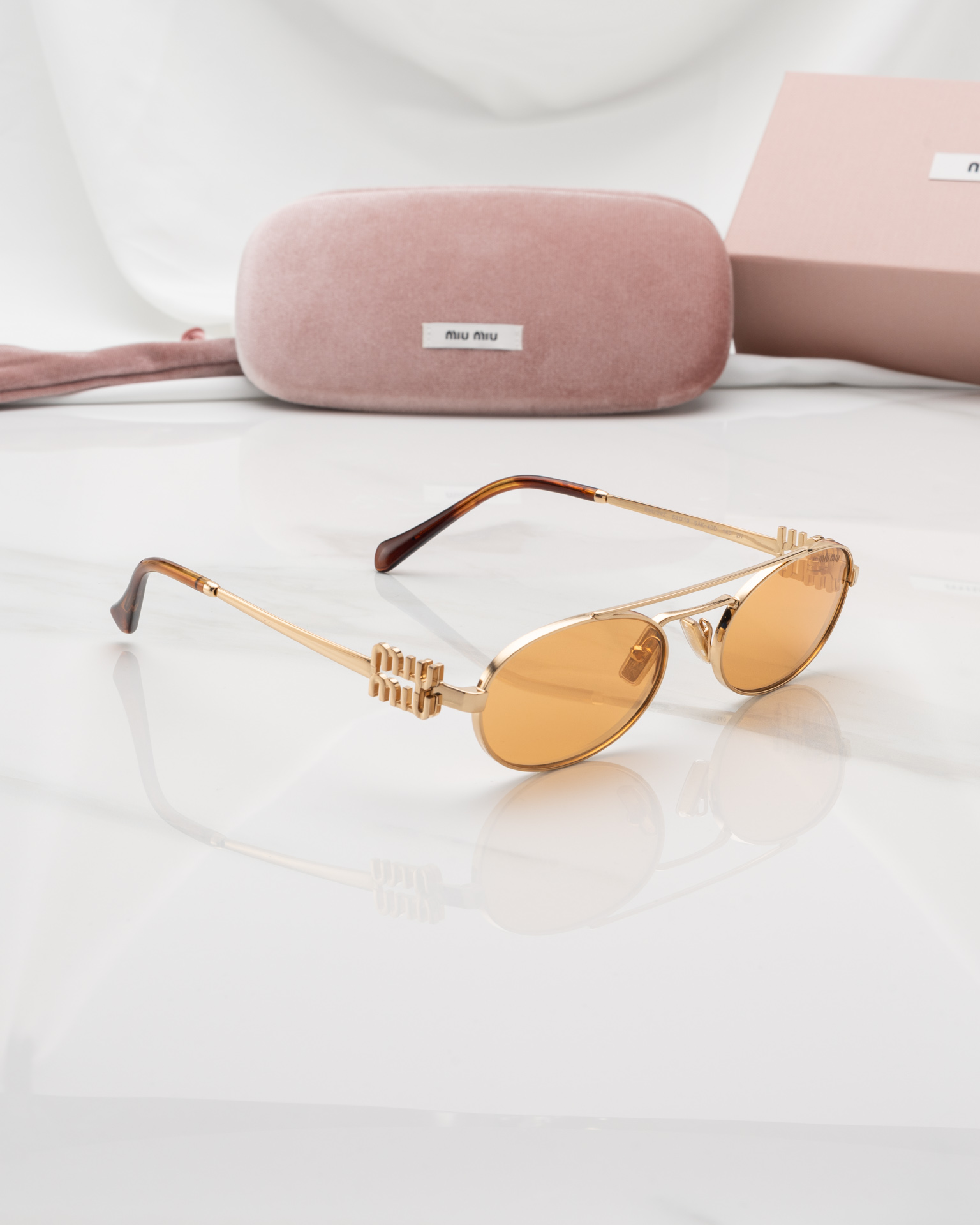 แว่นกันแดด Miu Miu MU54ZS 5AK40D