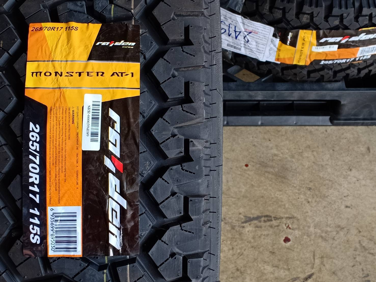 RAIDEN 265/70R17 MONSTER AT-1 115S (ตัวหนังสือขาว) MADE IN CHINA