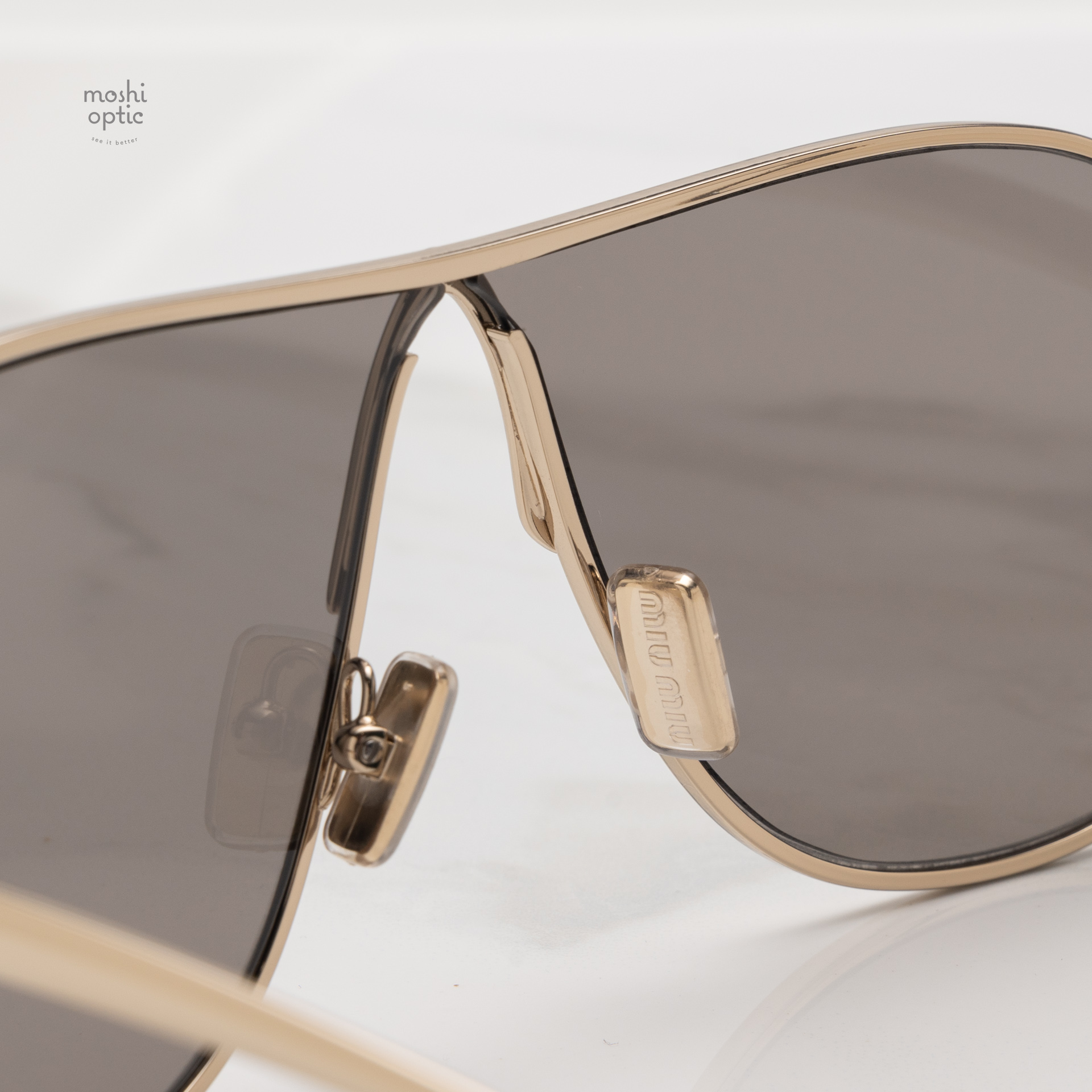 แว่นกันแดด Miu Miu MUA56S ZVN80Q