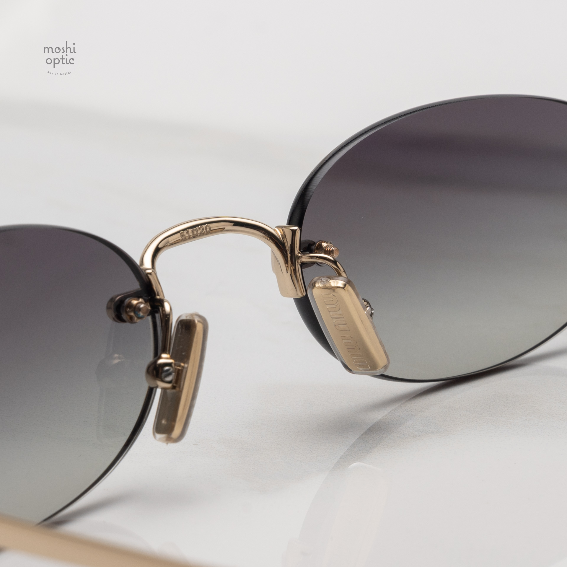 แว่นกันแดด Miu Miu MUA54S ZVN5D1