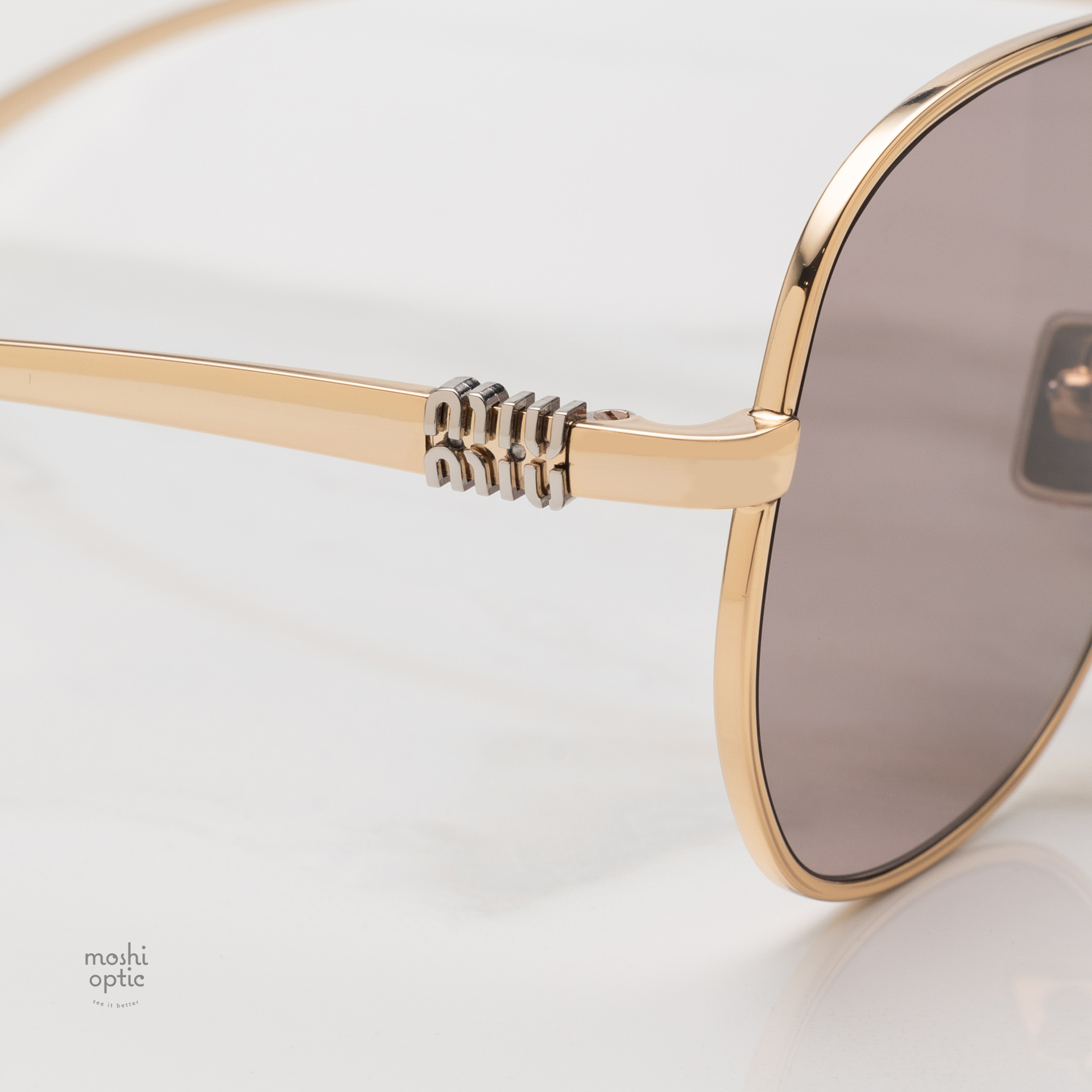 แว่นกันแดด Miu Miu MUA56S 5AK20I