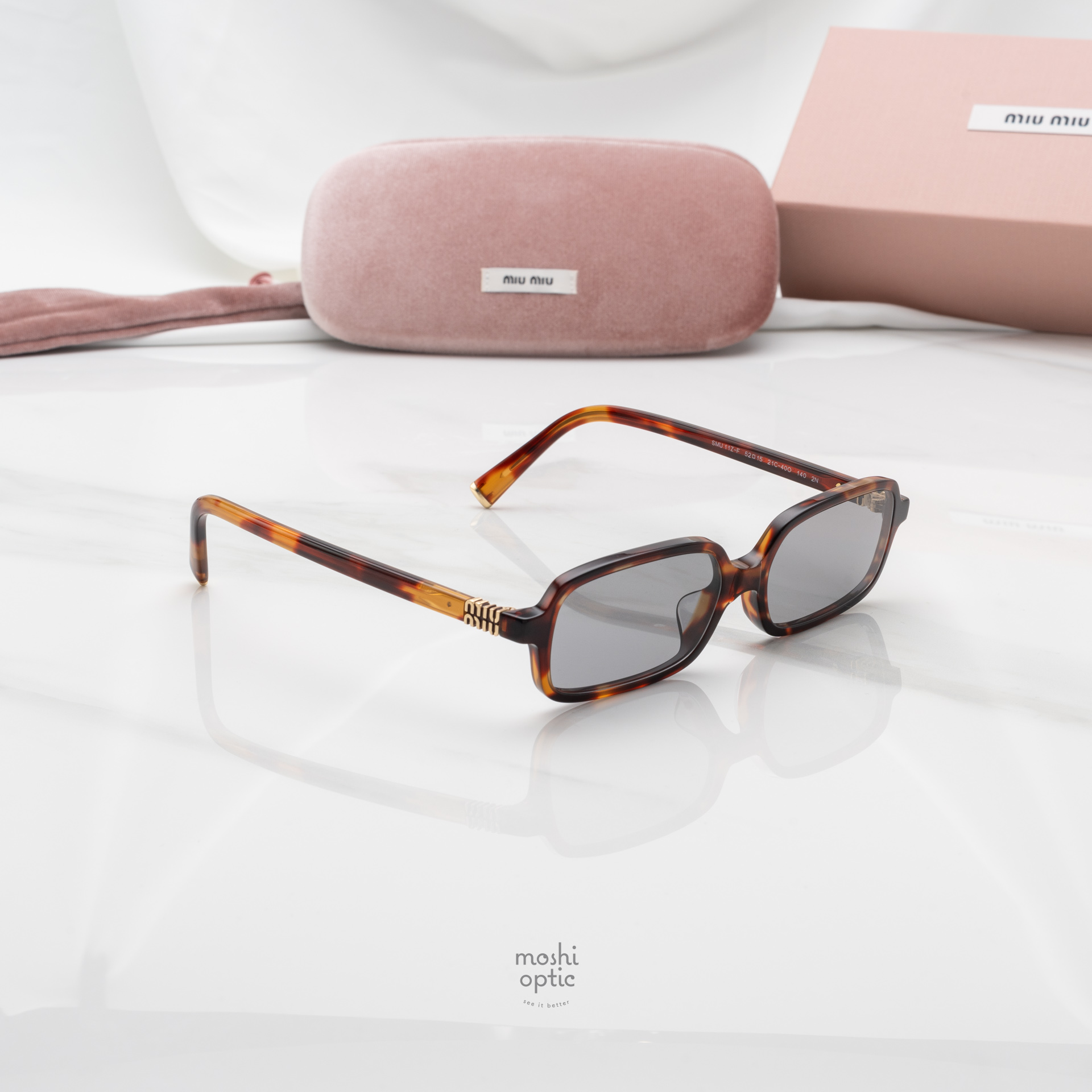 แว่นกันแดด Miu Miu MU11ZSF 21C40O