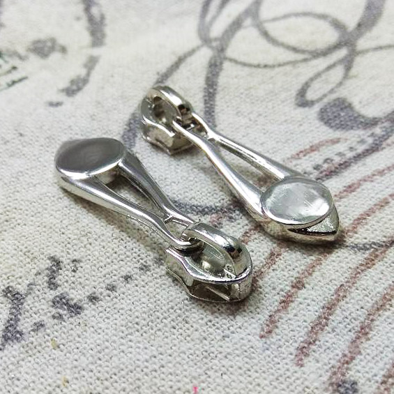 หัวซิบแป้น เงิน