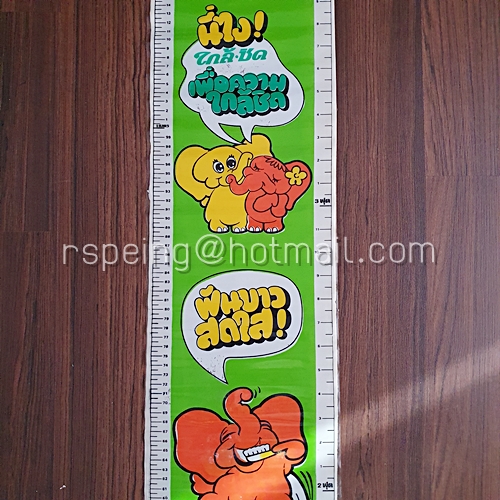 โปสเตอร์วัดส่วนสูงติดผนัง ยาสีฟันใกล้ชิด