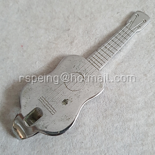 ที่เจาะกระป๋องสแตนเลสรูปกีต้าร์ ยี่ห้อ IDEAL ของญี่ปุ่น