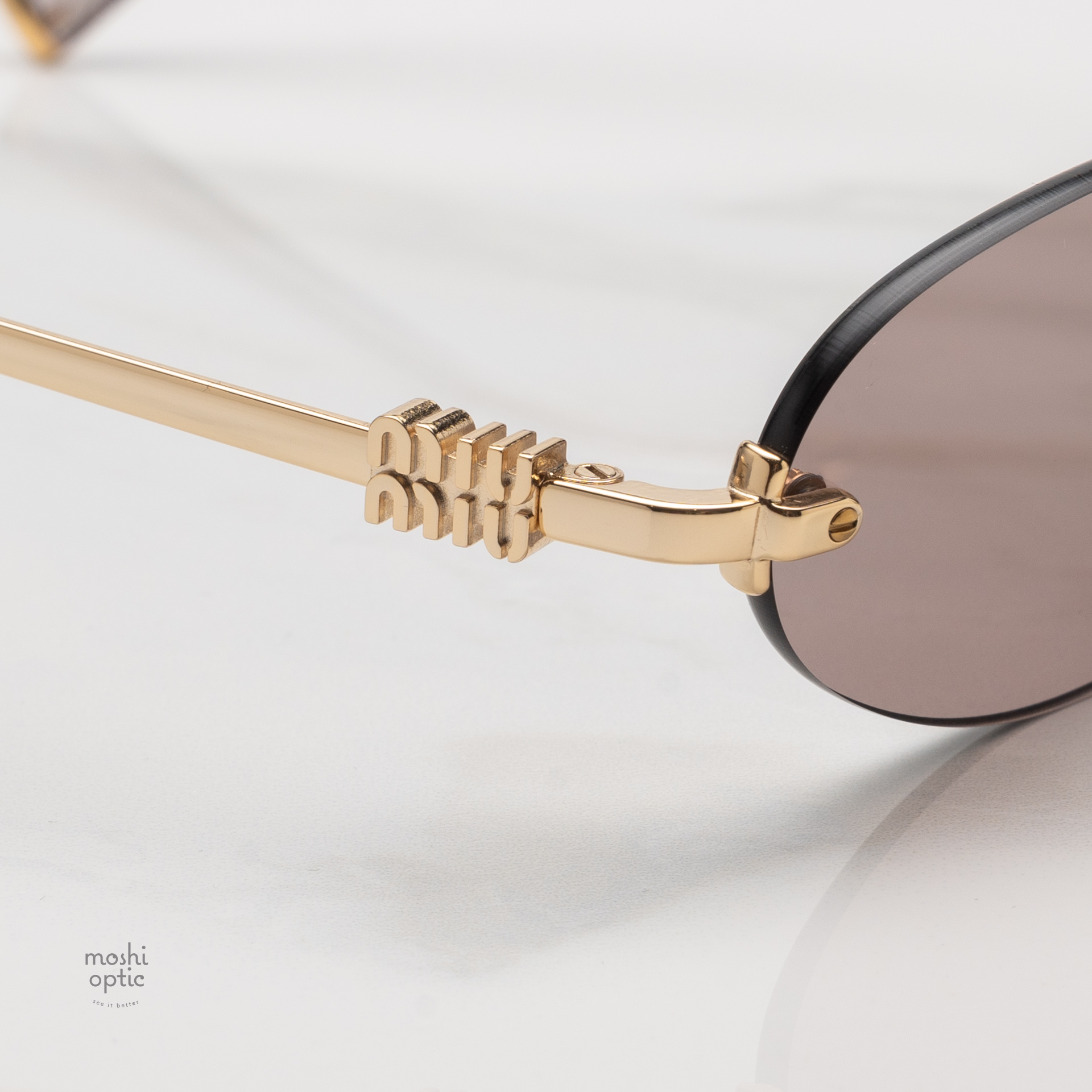 แว่นกันแดด Miu Miu MUA54S 5AK20I