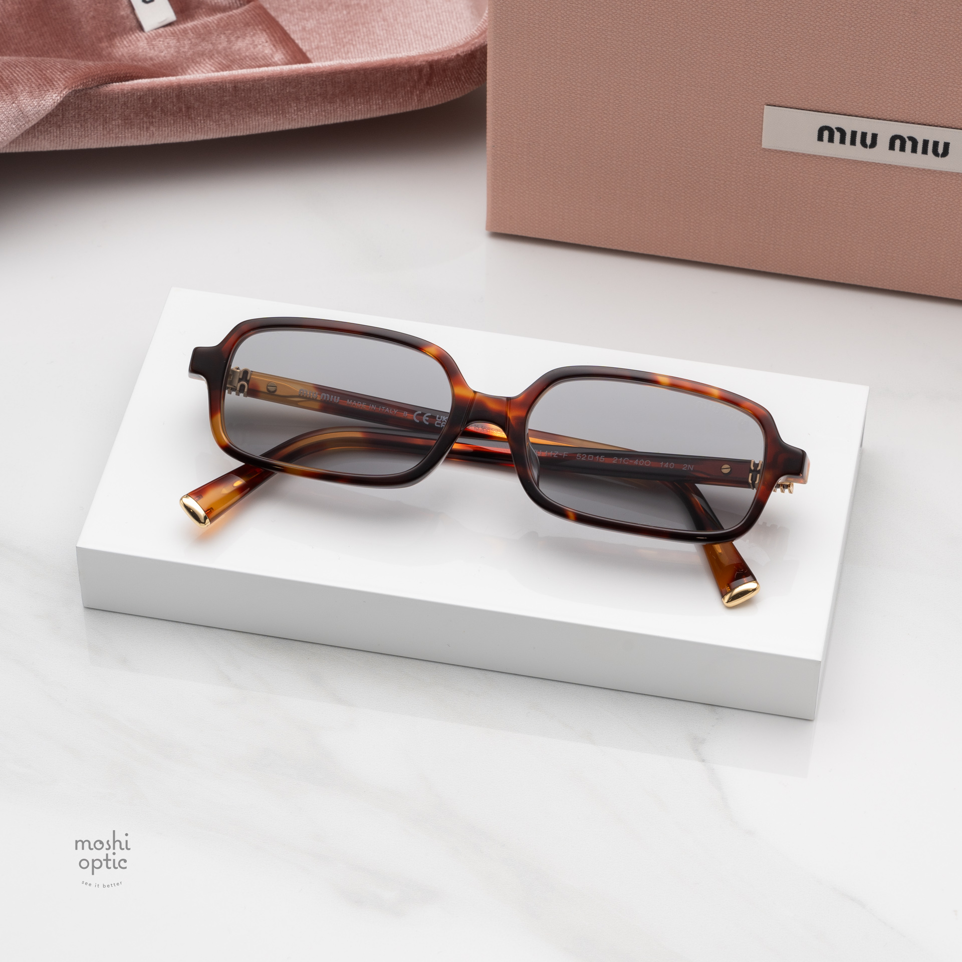 แว่นกันแดด Miu Miu MU11ZSF 21C40O
