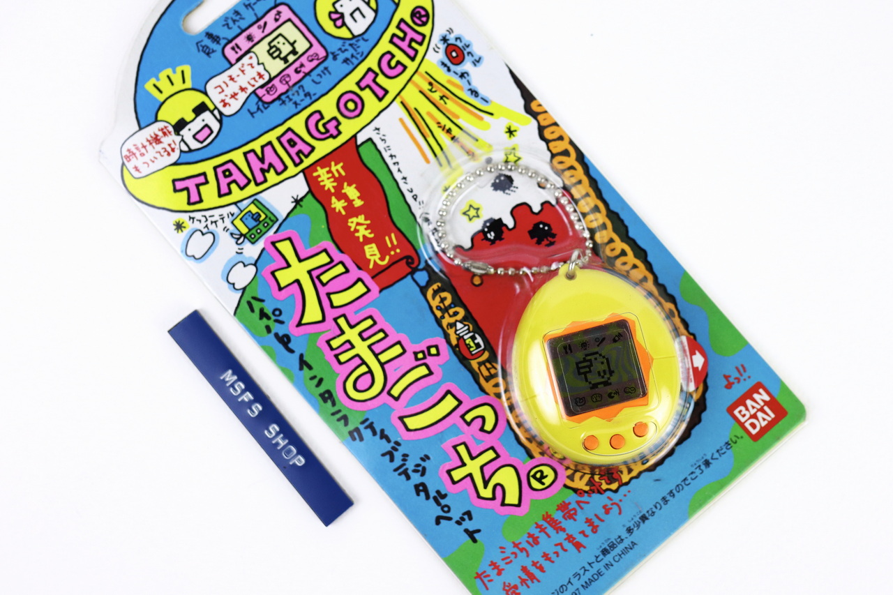 [Vintage] Tamagotch สีเหลือง รุ่นเก่ายุค 90s ในแพ็คเกจ