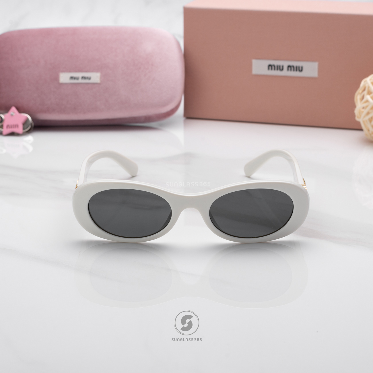 แว่นกันแดด Miu Miu MU06ZS 1425S0