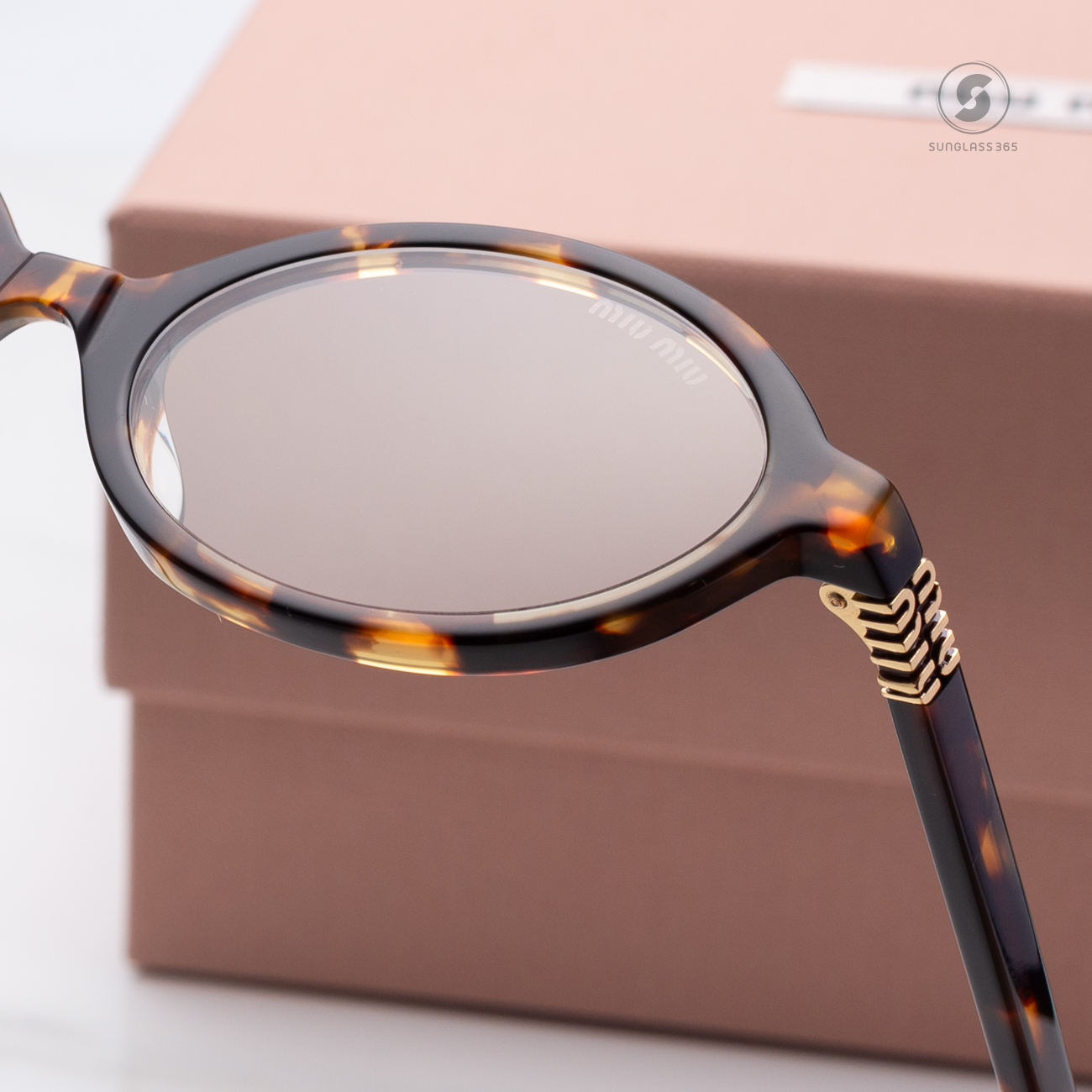 แว่นกันแดด Miu Miu MU04ZSF VAU08N